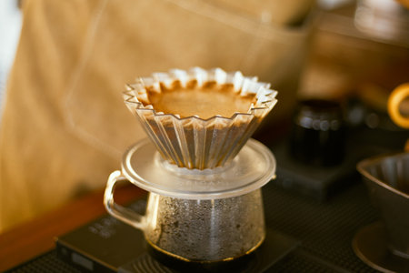 Alternative coffee brewing method, using pour over dripper and paper filter.の写真素材