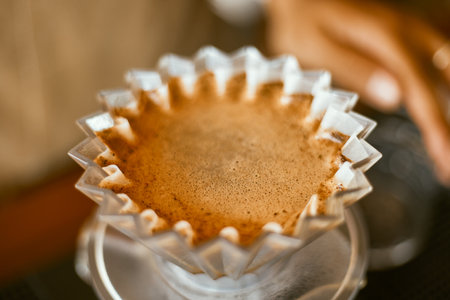 Alternative coffee brewing method, using pour over dripper and paper filter.の写真素材