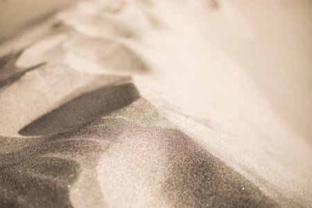 Fine sand on the sea coast.The sunlight is shining.の写真素材