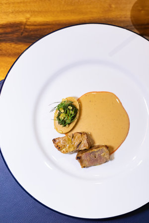 Close up grilled sliced beef steak with albufera sauceの写真素材