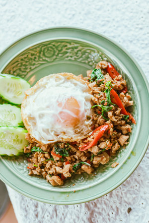 Stir Fried Basil Chicken , Fried Egg with Rice, Thai Foodの写真素材