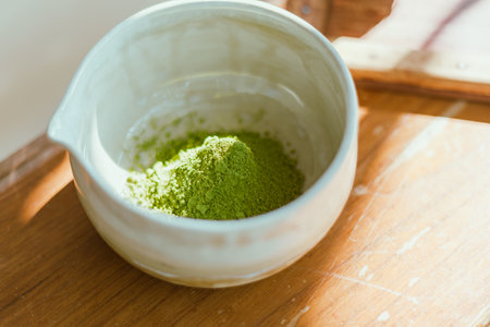 Close up matcha green tea powder in a bowlÂ の写真素材