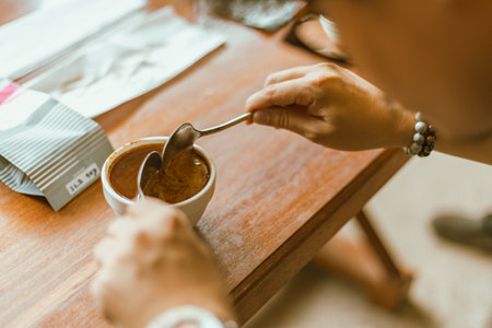 Barista preparing to test and inspecting the quality of coffee, selective focusの写真素材