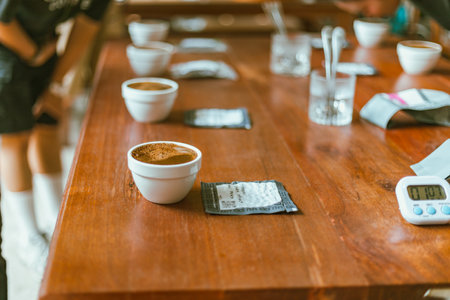 Barista preparing to test and inspecting the quality of coffee, selective focusの写真素材
