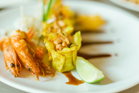 Beautiful and tasty street food on a plate, exquisite dish, creative restaurant meal conceptの写真素材