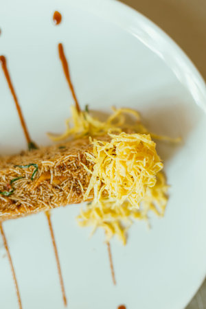 Beautiful and tasty street food on a plate, exquisite dish, creative restaurant meal concept