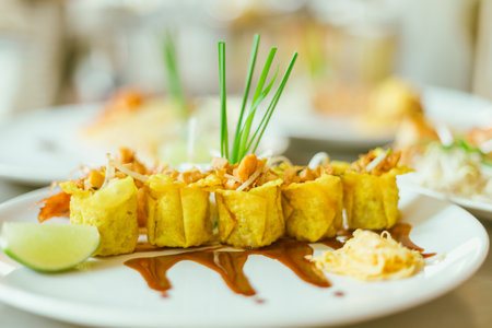 Beautiful and tasty street food on a plate, exquisite dish, creative restaurant meal conceptの写真素材