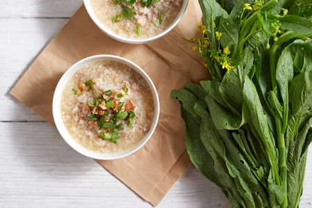 Rice porridge with minced pork on white Background.の写真素材