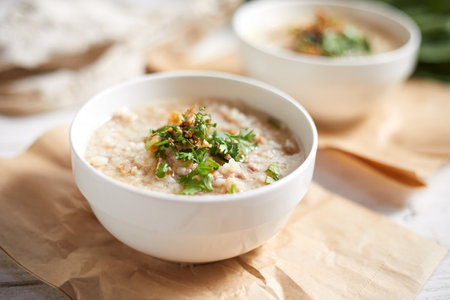 Rice porridge with minced pork on white Background.の写真素材