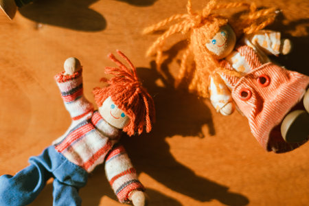 handmade wooden doll on blur background.の写真素材