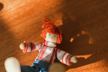 handmade wooden doll on blur background.の写真素材