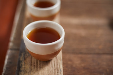 Close up hot tea on a rustic wood backgroundの写真素材