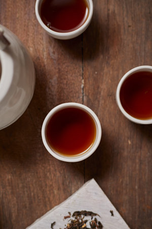 Close up hot tea on a rustic wood backgroundの写真素材