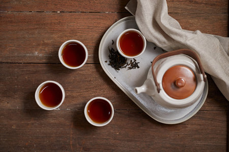 Close up hot tea on a rustic wood background
