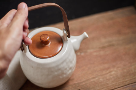 Close up hot tea on a rustic wood backgroundの写真素材