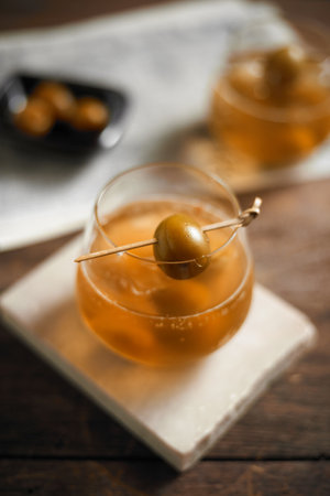 A glass of homemade Plum Wine with soda water and iceの写真素材