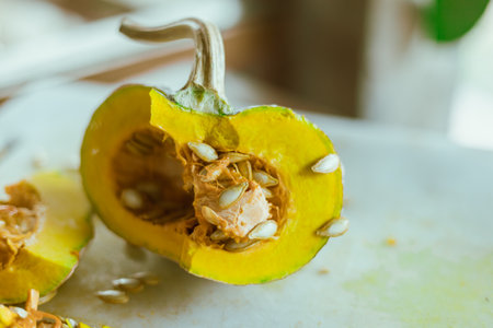 Slice of yellow pumpkin in the kitchenの写真素材