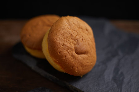 Slices of butter cake on plate, selective focusの写真素材