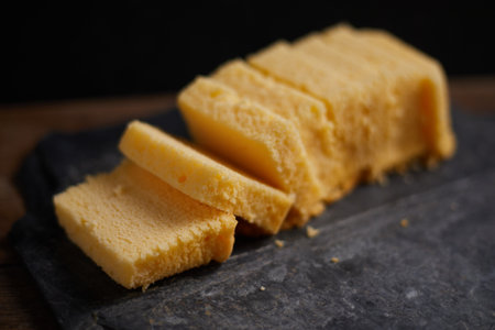 Slices of butter cake on plate, selective focusの写真素材