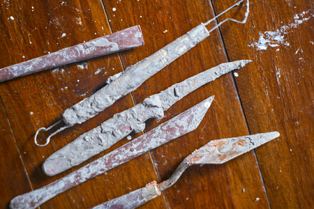 Close up Tools for forming clay on background,The process of creating pottery.Â の写真素材