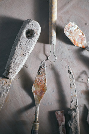 Close up Tools for forming clay on background,The process of creating pottery.Â の写真素材