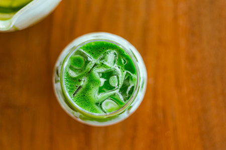 Close up iced matcha latte tea with milk.の写真素材
