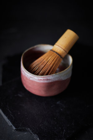 Tea bowl ceramic on dark background. studio lightの写真素材