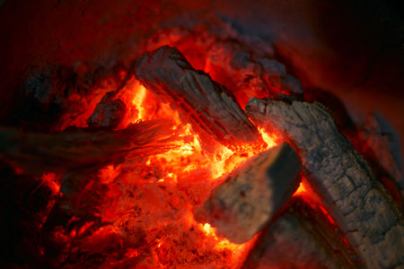 Close up of red hot charcoal stoveの写真素材