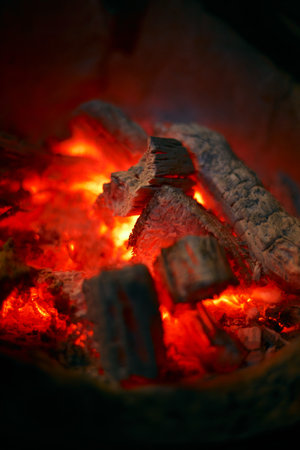 Close up of red hot charcoal stoveの写真素材