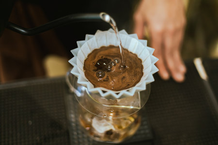 Hand drip coffee, Barista making drip coffee.の写真素材