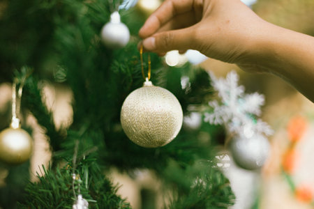 Close up of a hanging Chistmas tree bauble patternedの写真素材