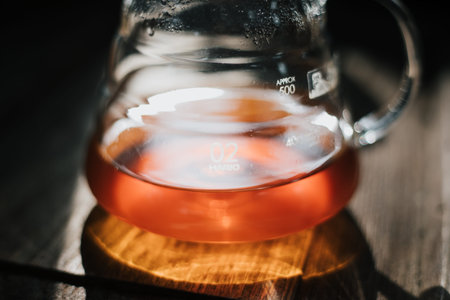 black drip coffee in glass server , selective focus
