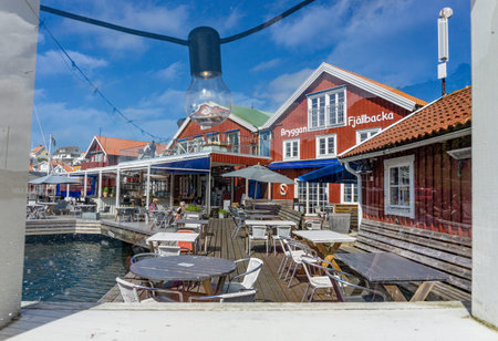 FjÃ¤llbacka, Sweden -June 10, 2021: View through window in fence by well-known Swedish restaurant...