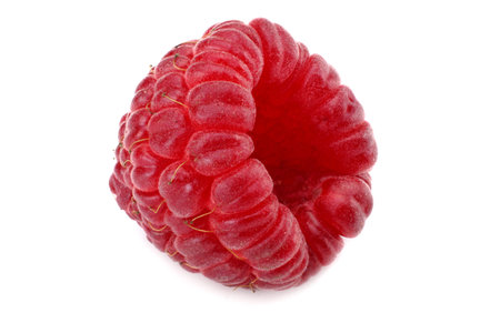 ripe raspberries with green leaf isolated on white background macro