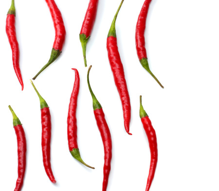 red hot chili peppers isolated on white background top viewの写真素材