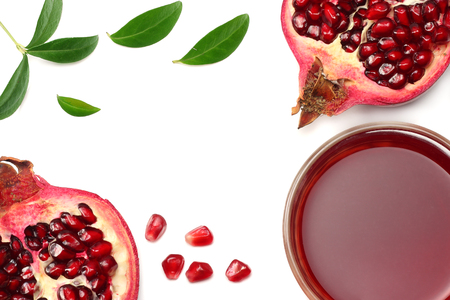 Pomegranate juice with pomegranate isolated on a white background top viewの写真素材