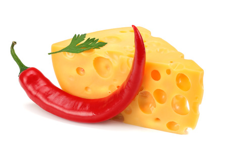 piece of cheese with chili pepper isolated on white backgroundの写真素材