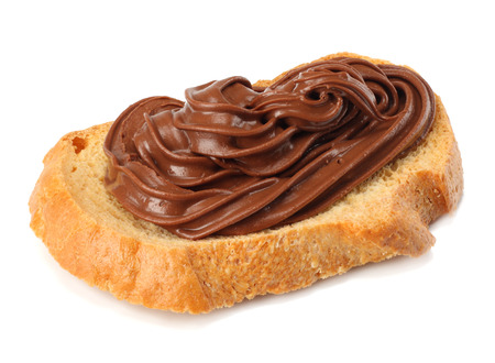 Slice of bread with chocolate cream isolated on white backgroundの写真素材