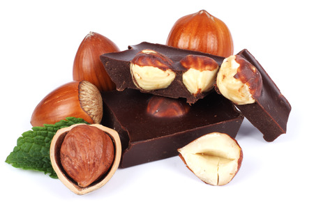 chocolate candies sweets with hazelnut isolated on white backgroundの写真素材