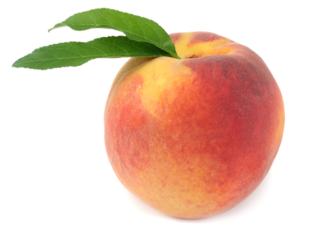 peach fruit with green leaf isolated on white backgroundの写真素材