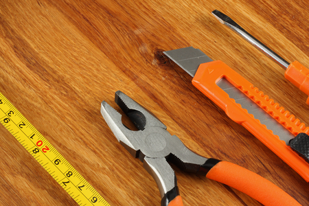industrial tools on light wooden background with copy space. top view. tools texture. tools backgroundの写真素材