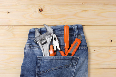 industrial tools on light wooden background with copy space. top view. tools texture. tools backgroundの写真素材
