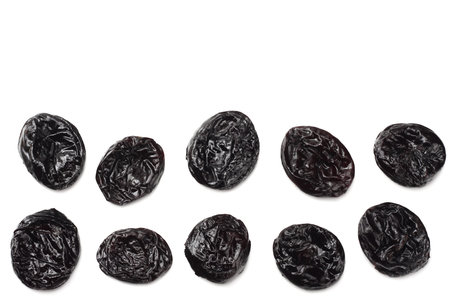 Dried plums - prunes isolated on white background. top viewの写真素材