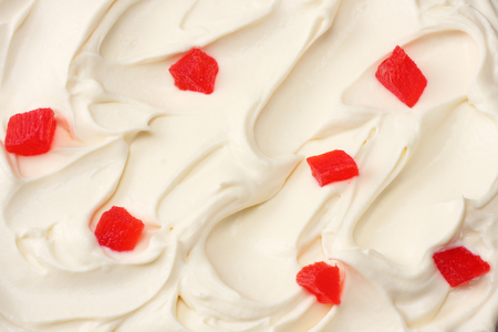 yogurt background with papaya pieces. yogurt texture. top viewの写真素材