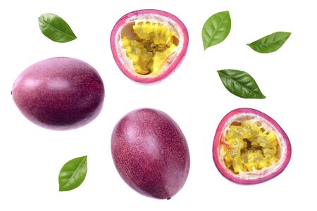 fresh passion fruits with leaves isolated on white background. top viewの写真素材