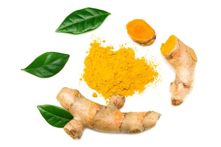 Turmeric powder with turmeric root isolated on white background. Top view.の写真素材