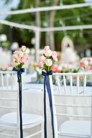 Wedding ceremony setup by the beach, selective and soft focusの写真素材