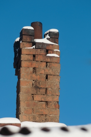 chimney on blue skyの写真素材