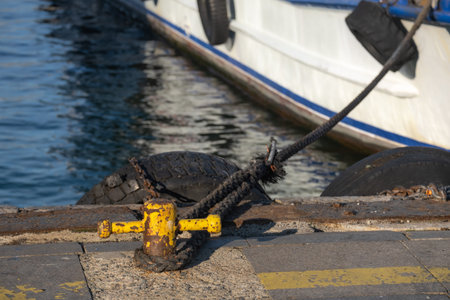 bollard and rope on the pier, makefast,