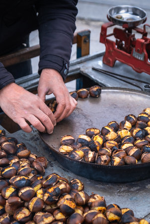 fried chestnut vendor, street food, kitchen scalesの写真素材